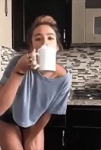 Drinking Coffee And Shaking Her Butt