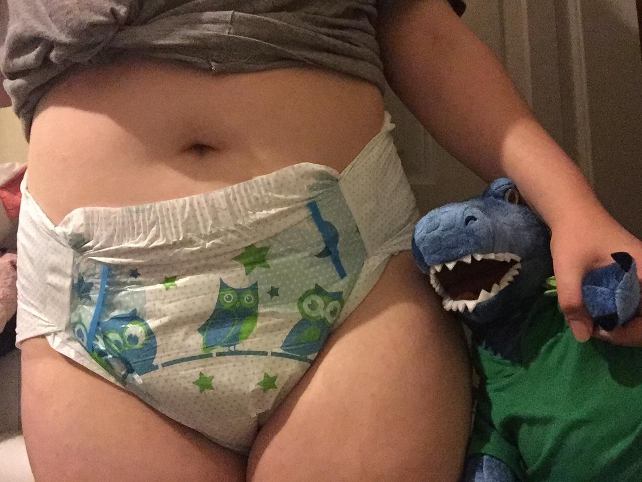 This lil girl is up way past her bedtime - but she is so happy to be diapered again! This is my first time trying the Kiddos (or any single taped diaper, actually) and I’m in love with them so far! Now, Chomper and I are off to bed, night night :)