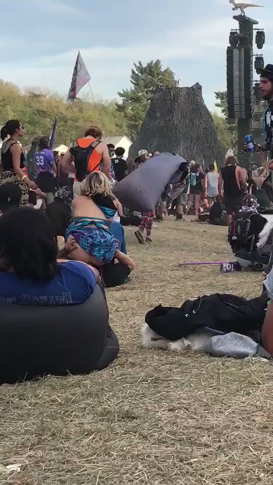 Girl let’s 2 guys eat her ass at Lost Lands Music Festival.