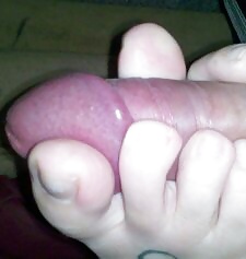 A footjob after our shower ends in a big load