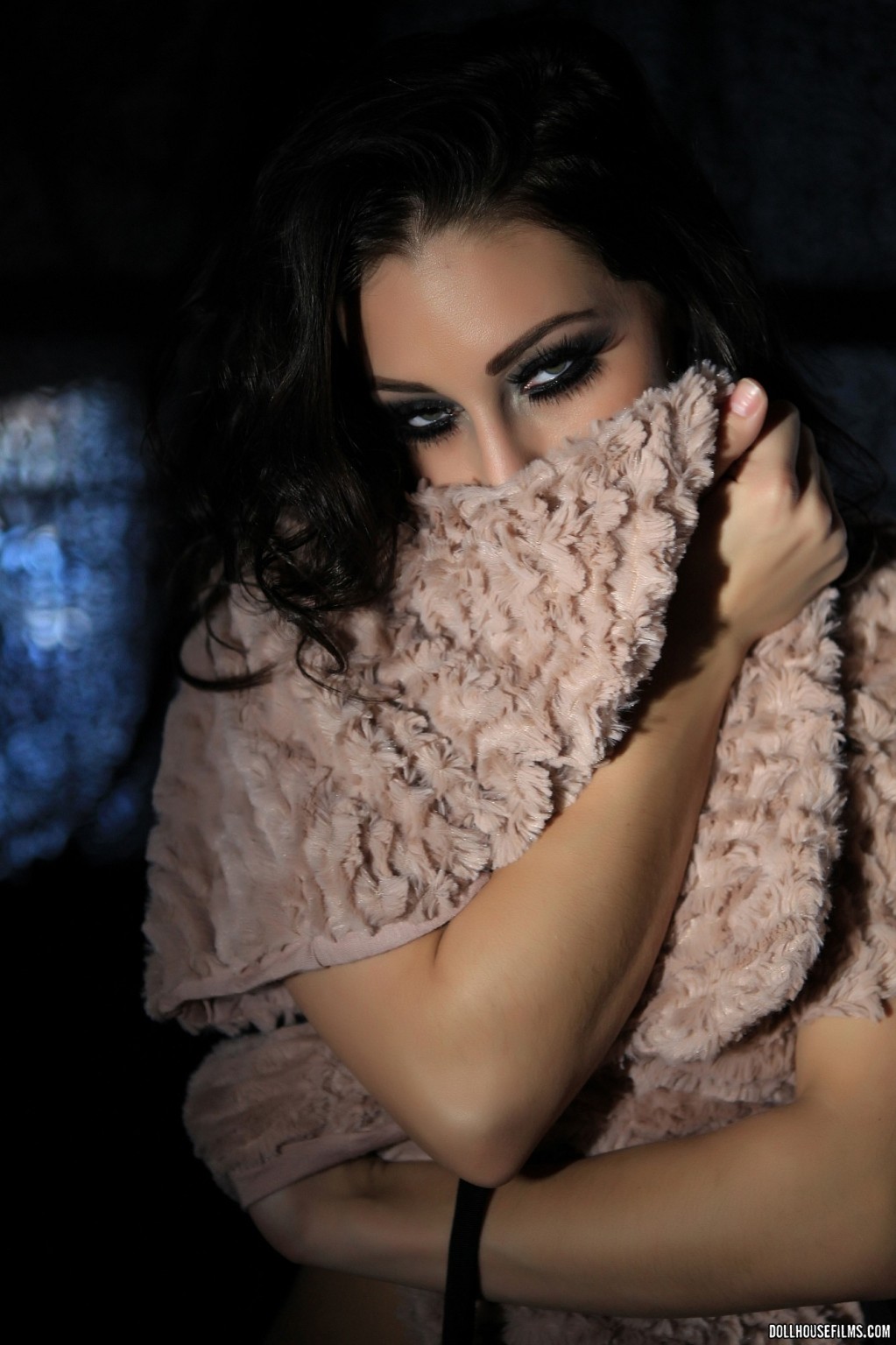 Gracie Glam posing seductively as she toys with a Scarf