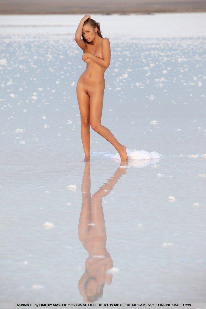 Pictures of Darina B all wet for you on the beach
