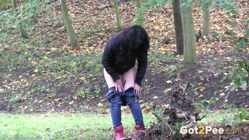 Cute teen is shy but pees while outside