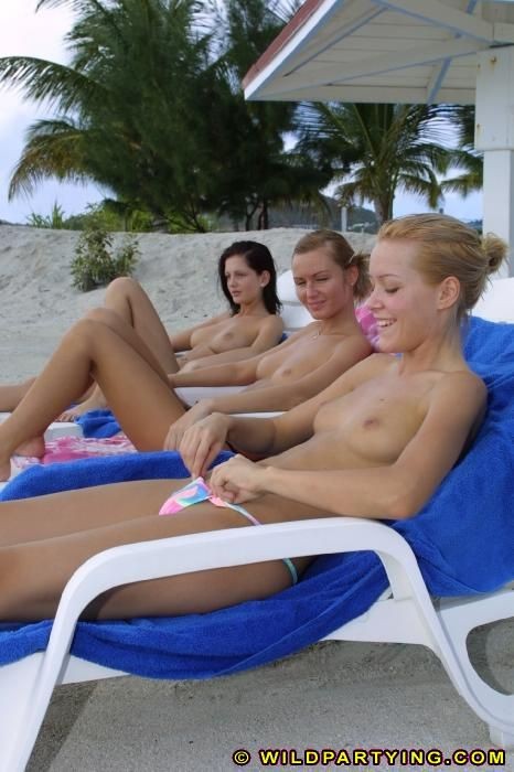 Three lesbian beach babes