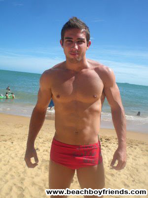 Amateur hunk boys wearing their tight trunks at the beach