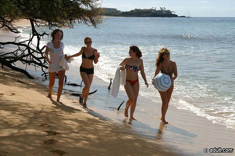 Four lesbians on a Hawaiian beach