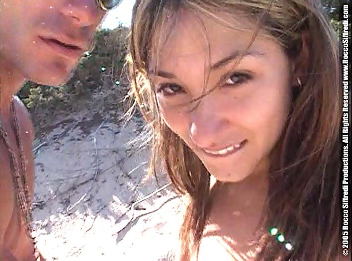 Two hot babes get fucked and facialized on a beach in Ibiza