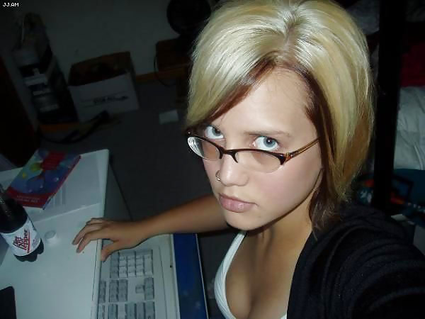 Fantastic blonde chick with glasses.