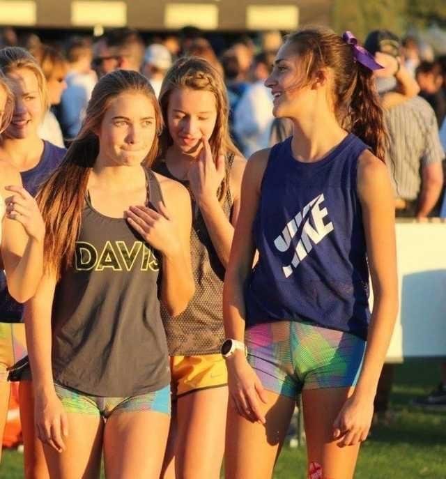 Cute College Freshmen with their pussy lips smacked up against spandex shorts