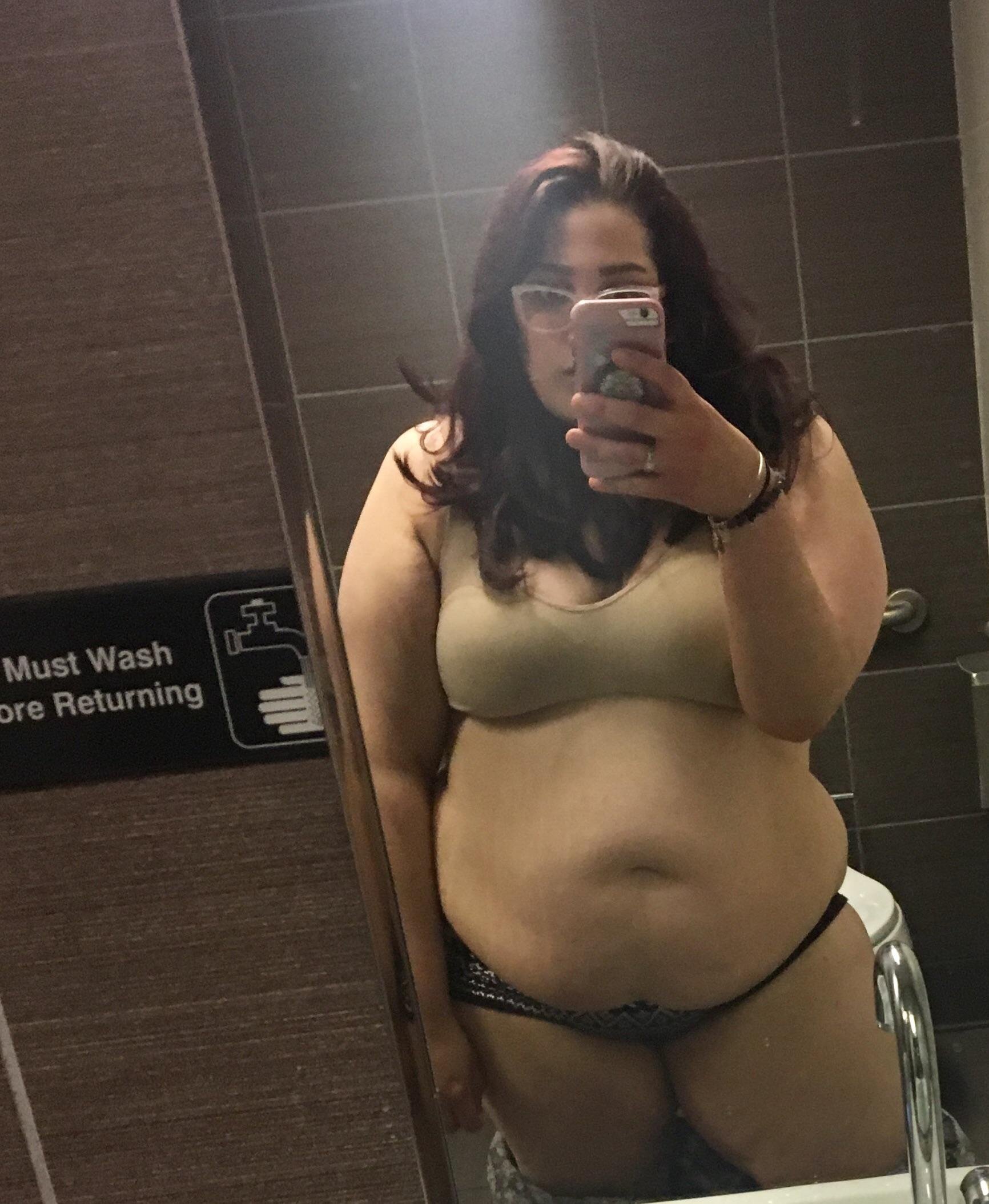 Public bathroom mirror pic.. showing off my figure