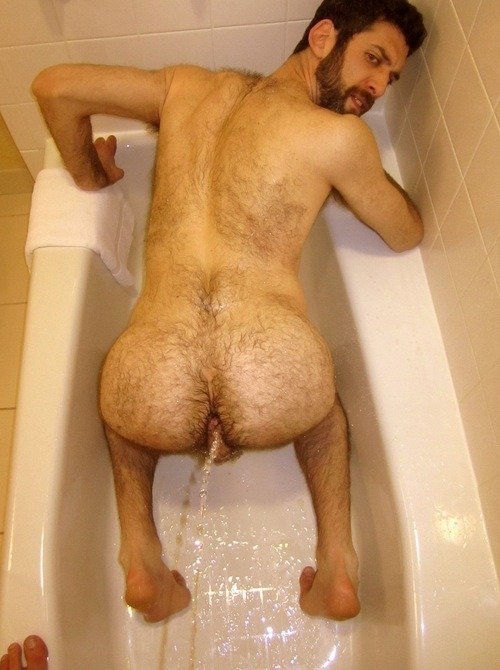 Pissing in his hairy hole