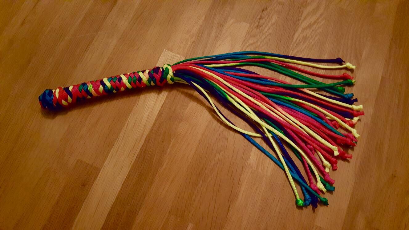 My first paracord flogger - posted it on r/BDSM before I found this sub! Not perfect, but my Master loves it...and so do I 
