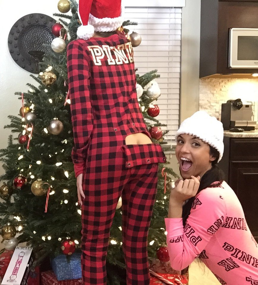 Misty Gates and Janessa Brazil having fun in their onsies at Christmas