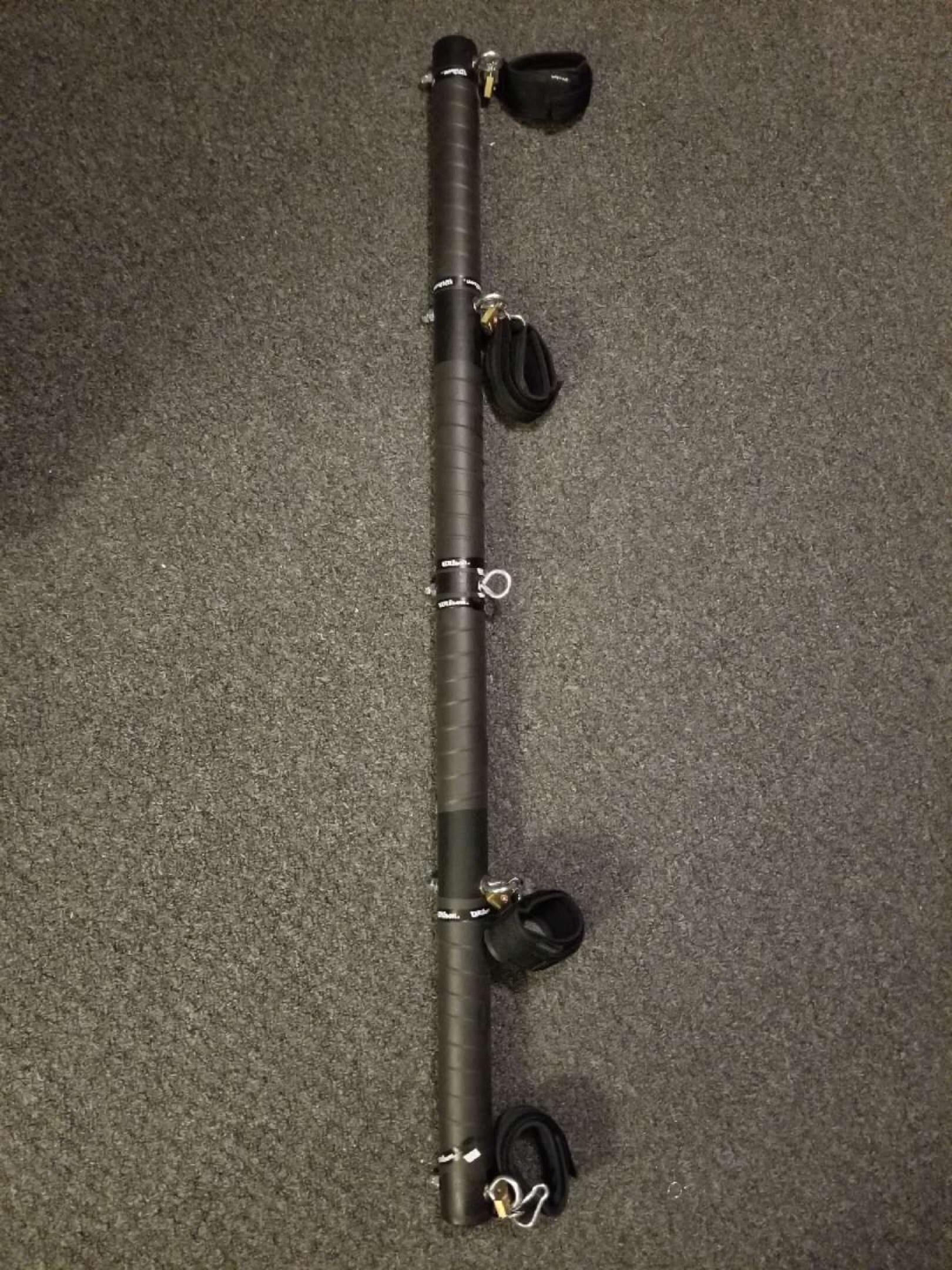 First attempt at a spreader bar. We already had the cuffs, so a few padlocks with the same key make it work great.