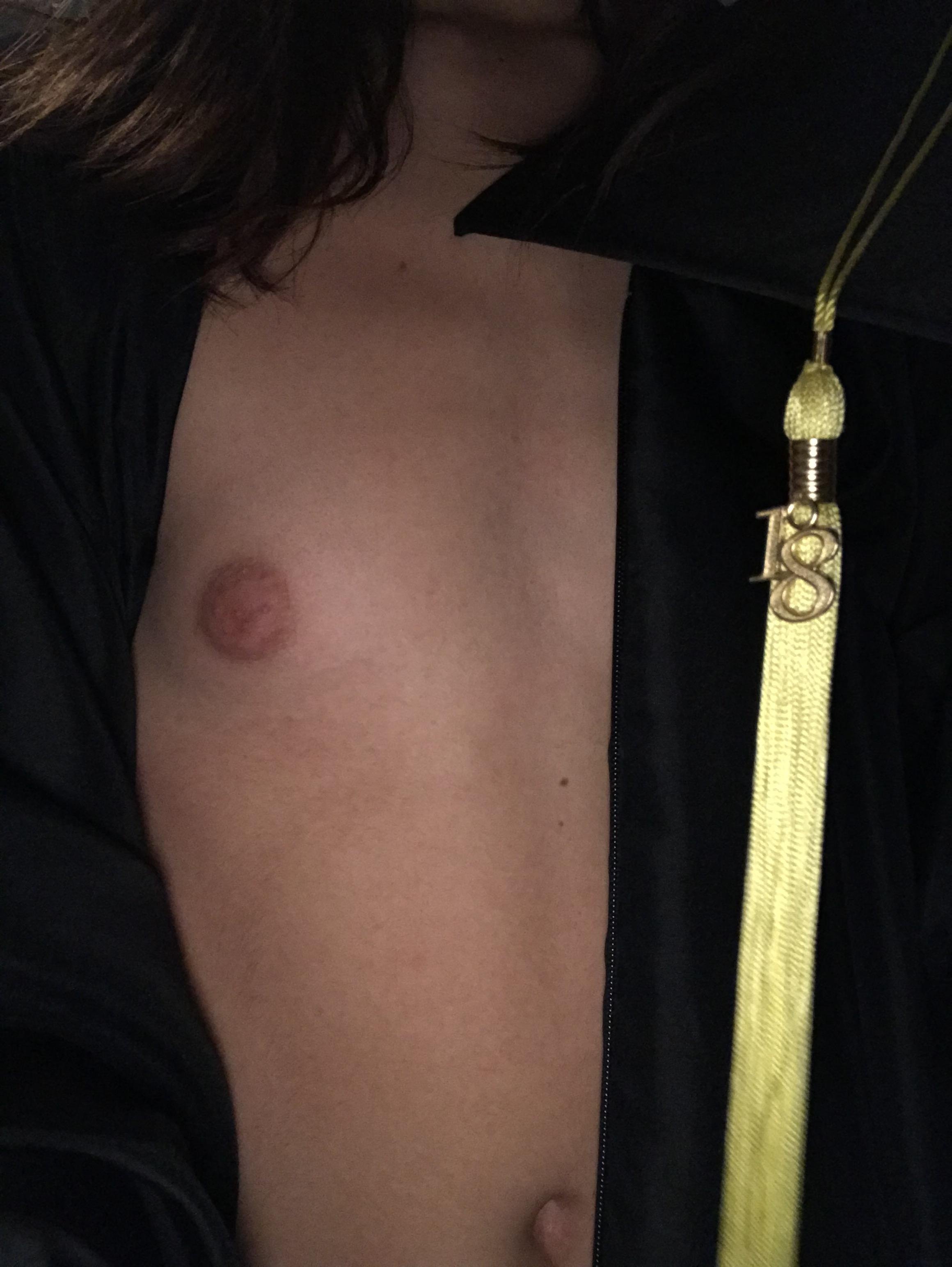 Wearing my graduation robe, thinking of you guys