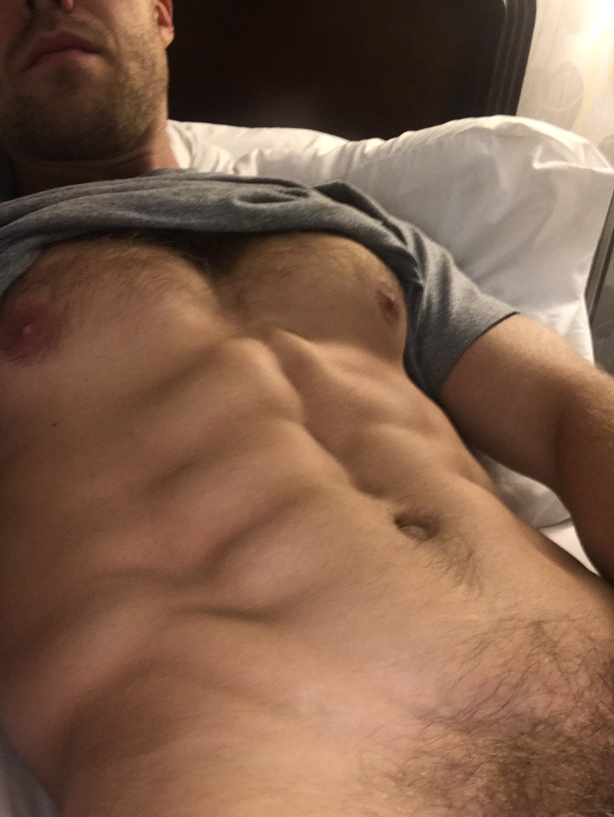 Showing off my V from my hotel bed