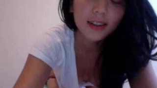 Amateur Korean Dances topless in front of her cam
