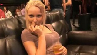 Blonde Babe flashing and masturbating at a club