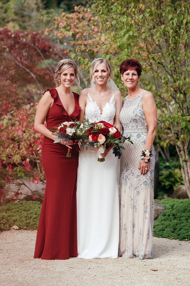 A mom and her daughters celebrating a wedding