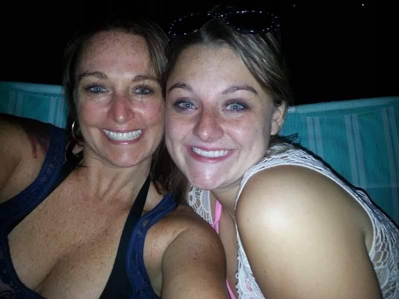 Mom or daughters smile