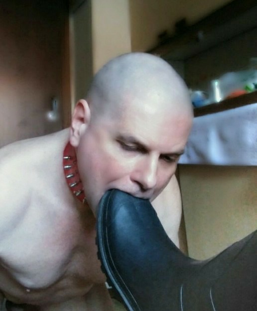the submissive faggot sucks cocks and boots