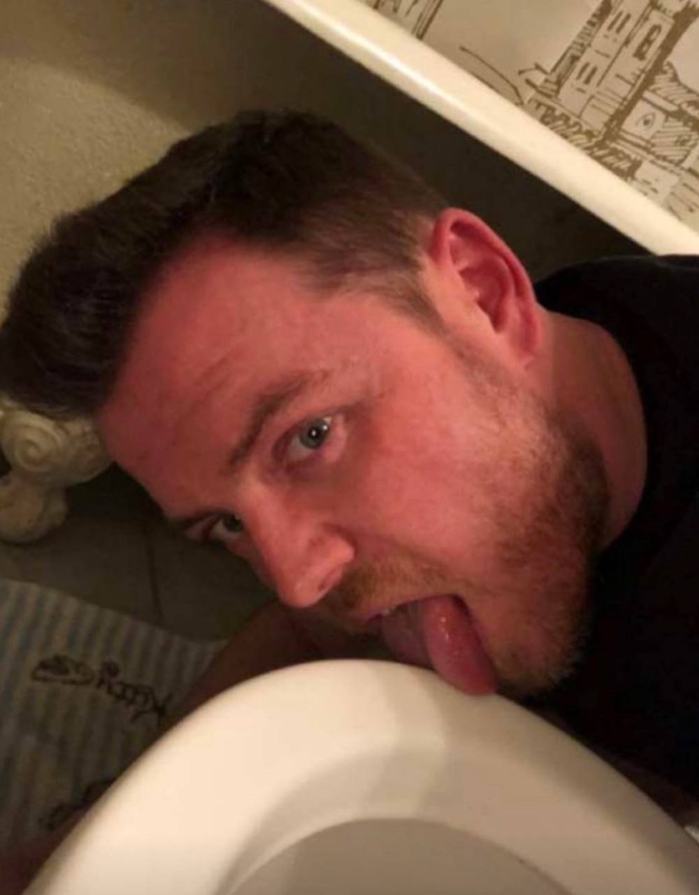 Faggot Joseph licking toilet 